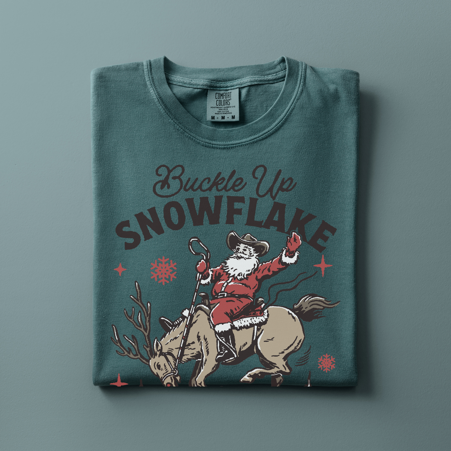 Buckle Up Snowflake | Christmas Cowgirl | T-shirt
