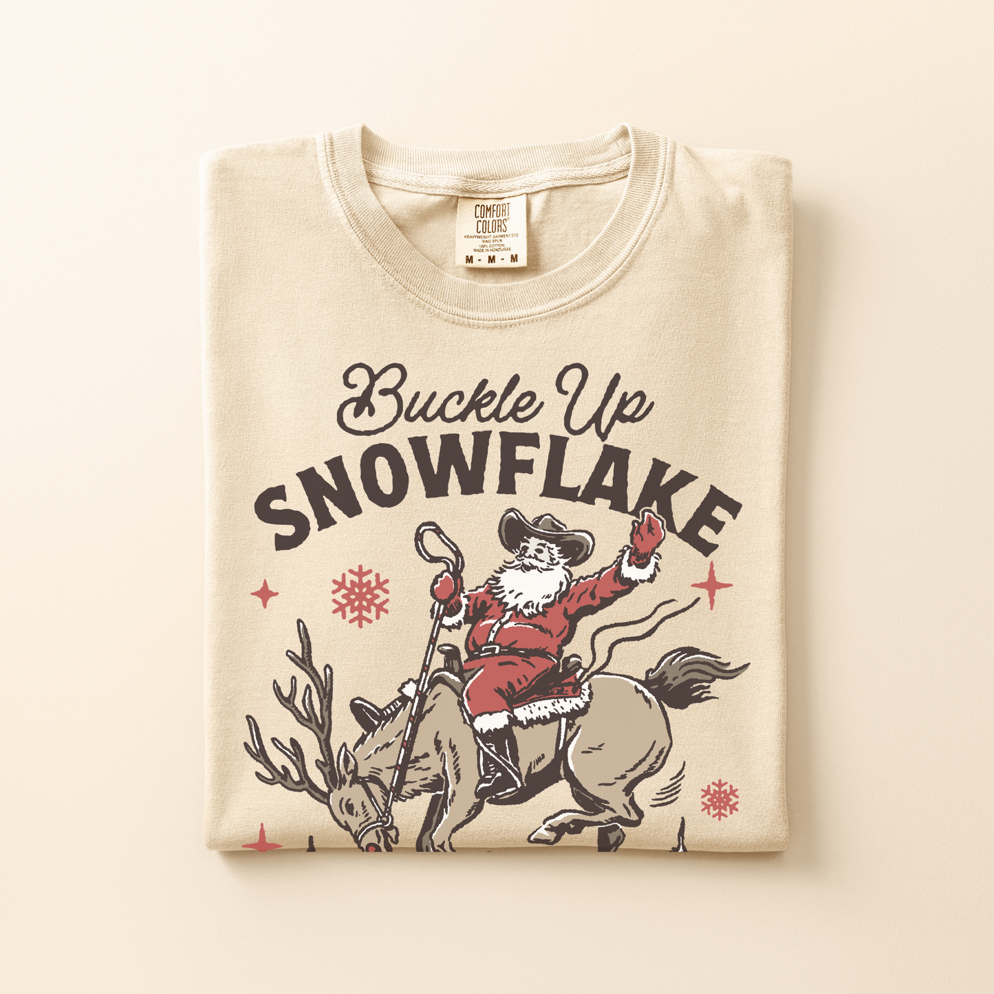 Buckle Up Snowflake | Christmas Cowgirl | T-shirt