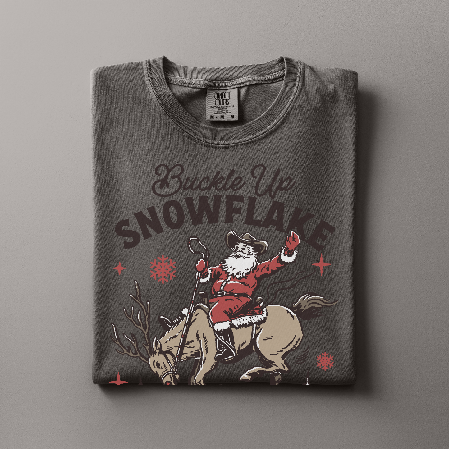 Buckle Up Snowflake | Christmas Cowgirl | T-shirt