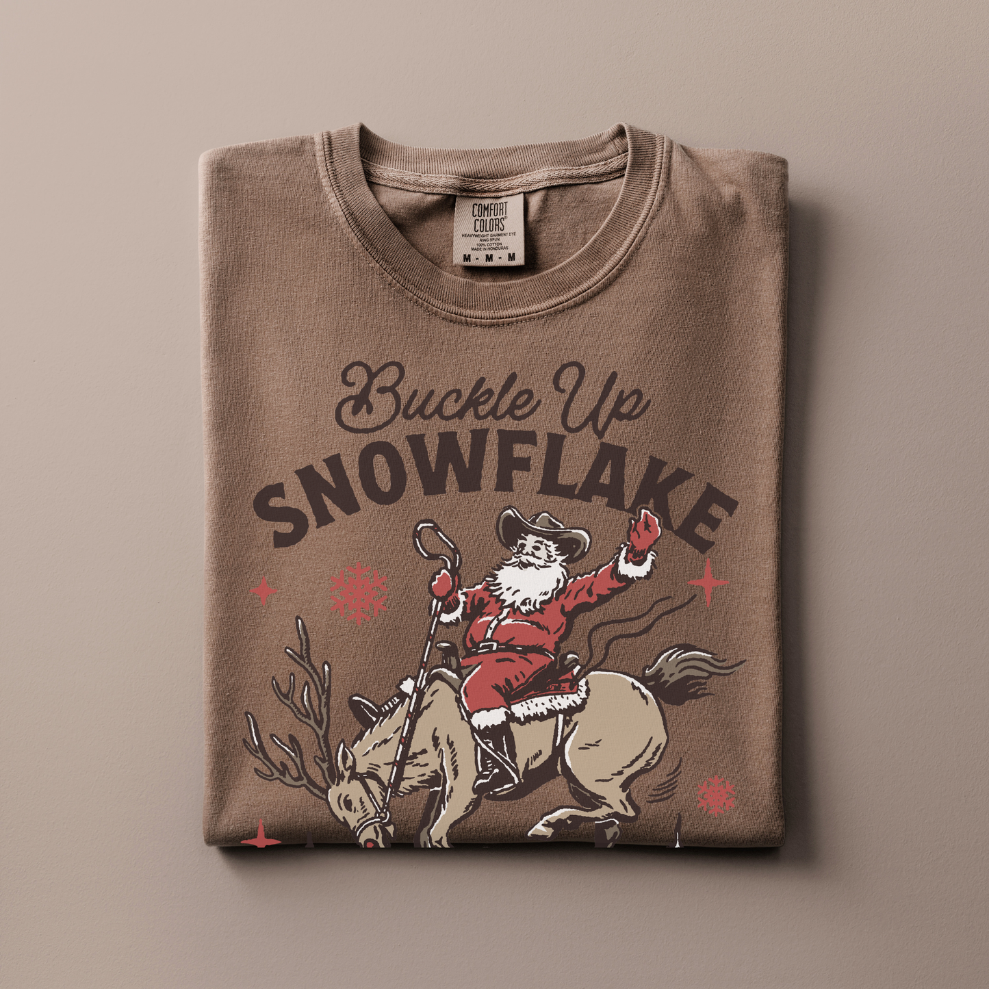 Buckle Up Snowflake | Christmas Cowgirl | T-shirt
