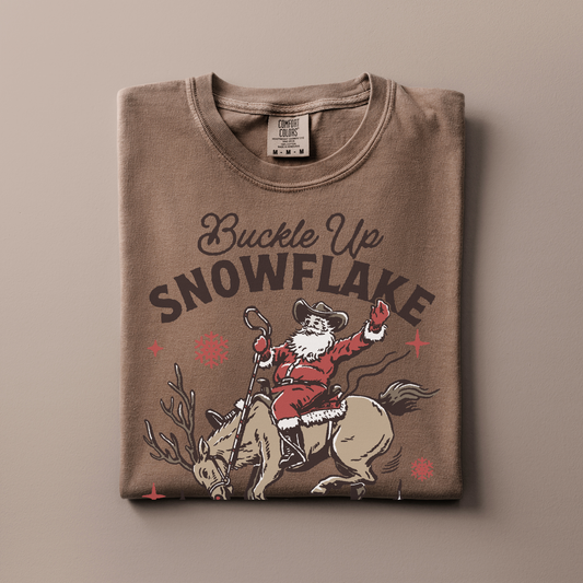 Buckle Up Snowflake | Christmas Cowgirl | T-shirt
